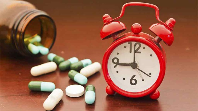 alarm clock and pills container